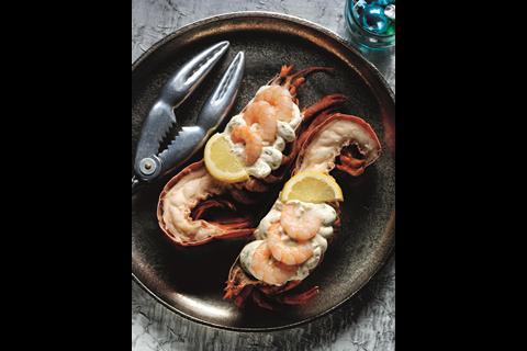 Caught in Canada, Asda's Extra Special Dressed Lobster is cooked and topped with cream cheese, chive mayonnaise and king prawns. 